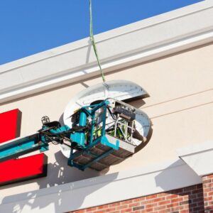 The installation of a large channel letter building sign