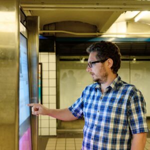 man using interactive signage