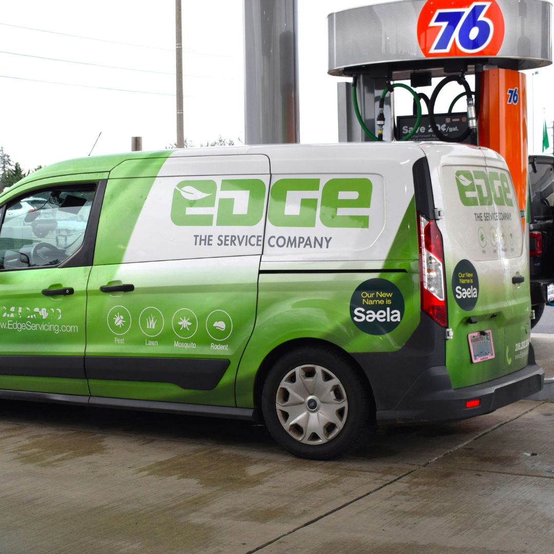 a work van with a full vehicle wrap