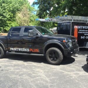 a vehicle and a trailer wrapped by sign central